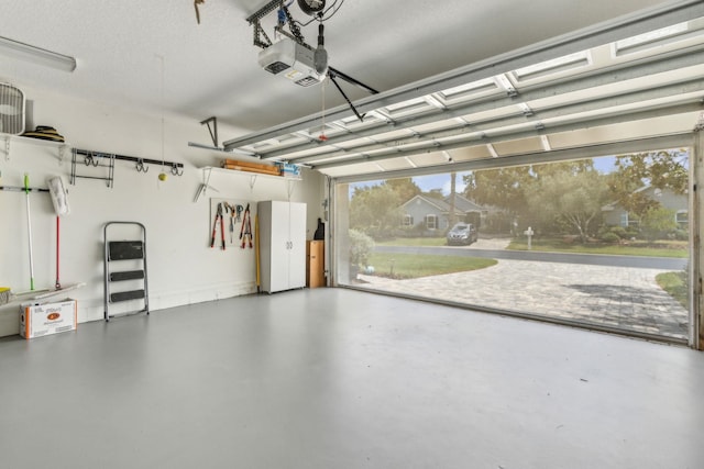 303 S Ocean Trace Rd, Saint Augustine, FL 32080 - garage featuring a garage door opener