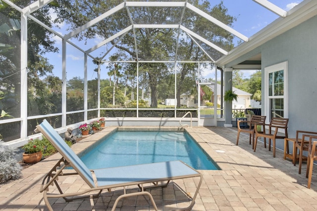 303 S Ocean Trace Rd, Saint Augustine, FL 32080 - outdoor pool with a patio and glass enclosure