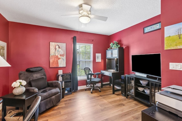 303 S Ocean Trace Rd, Saint Augustine, FL 32080 - office area with wood finished floors, a ceiling fan, and a textured ceiling