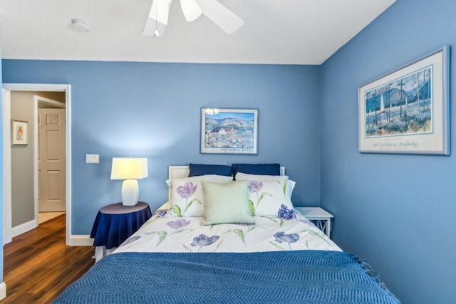 303 S Ocean Trace Rd, Saint Augustine, FL 32080 - bedroom featuring wood finished floors, baseboards, and ceiling fan