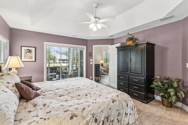 303 S Ocean Trace Rd, Saint Augustine, FL 32080 - carpeted bedroom featuring access to outside, ceiling fan, and baseboards