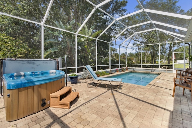 303 S Ocean Trace Rd, Saint Augustine, FL 32080 - swimming pool with a hot tub, a patio, and a lanai