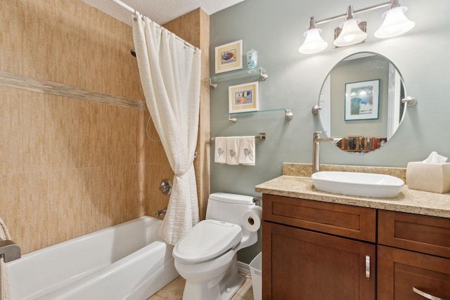 303 S Ocean Trace Rd, Saint Augustine, FL 32080 - full bath featuring toilet, vanity, shower / tub combo, and tile patterned floors