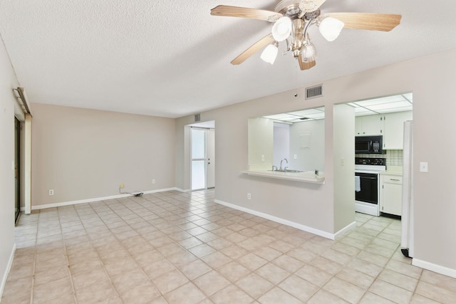 3 Tarragona Ct, Saint Augustine, FL 32086 - unfurnished room with ceiling fan, a sink, and a textured ceiling