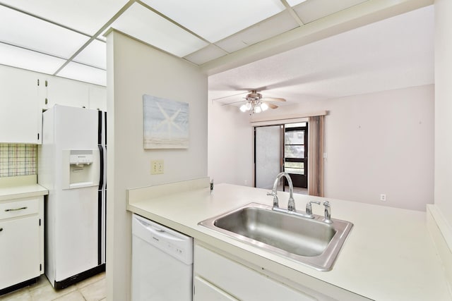 3 Tarragona Ct, Saint Augustine, FL 32086 - kitchen featuring white appliances, a sink, light countertops, and white cabinets
