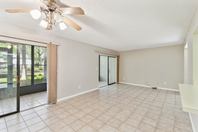 3 Tarragona Ct, Saint Augustine, FL 32086 - unfurnished room with a textured ceiling, a ceiling fan, and baseboards