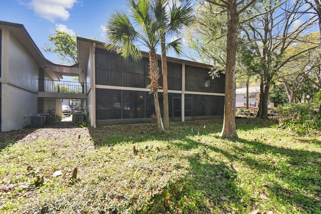 3 Tarragona Ct, Saint Augustine, FL 32086 - back of house with a sunroom and central air condition unit