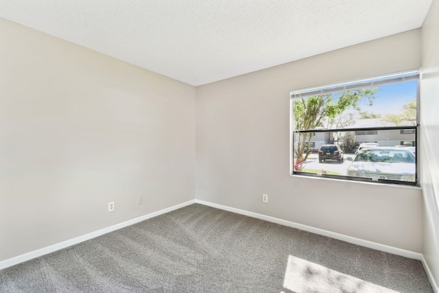3 Tarragona Ct, Saint Augustine, FL 32086 - carpeted empty room featuring baseboards and a textured ceiling