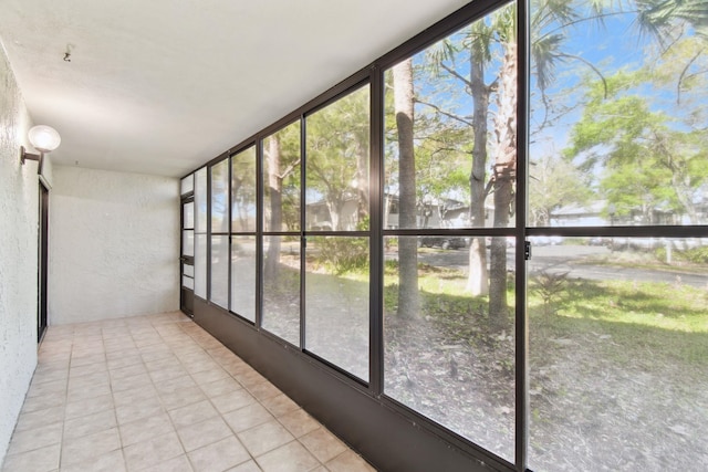 3 Tarragona Ct, Saint Augustine, FL 32086 - unfurnished sunroom featuring a textured wall