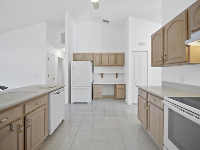 kitchen with built in desk, sink, light tile patterned floors, ceiling fan, and white appliances