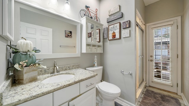 700 N Indigo Ter, Saint Johns, FL 32259 - full bath with toilet, a shower stall, vanity, and baseboards