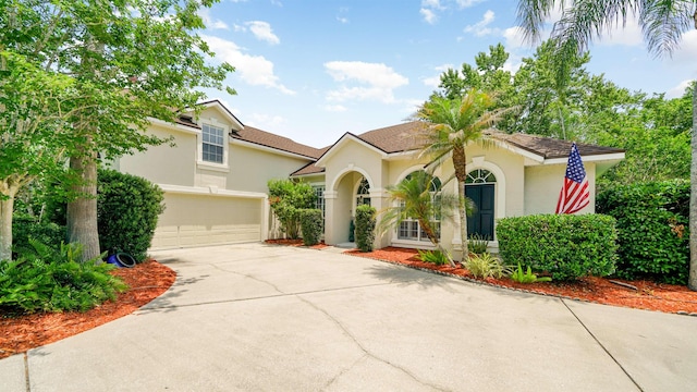 700 N Indigo Ter, Saint Johns, FL 32259 - mediterranean / spanish house with stucco siding and concrete driveway