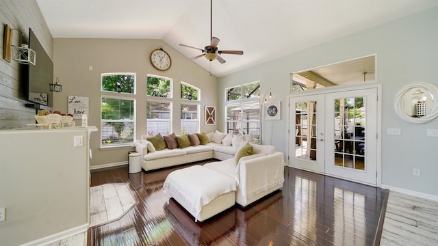 700 N Indigo Ter, Saint Johns, FL 32259 - living area featuring a ceiling fan, french doors, wood finished floors, baseboards, and high vaulted ceiling