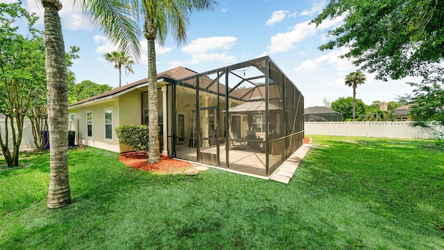 700 N Indigo Ter, Saint Johns, FL 32259 - back of property with stucco siding, a lanai, and a patio