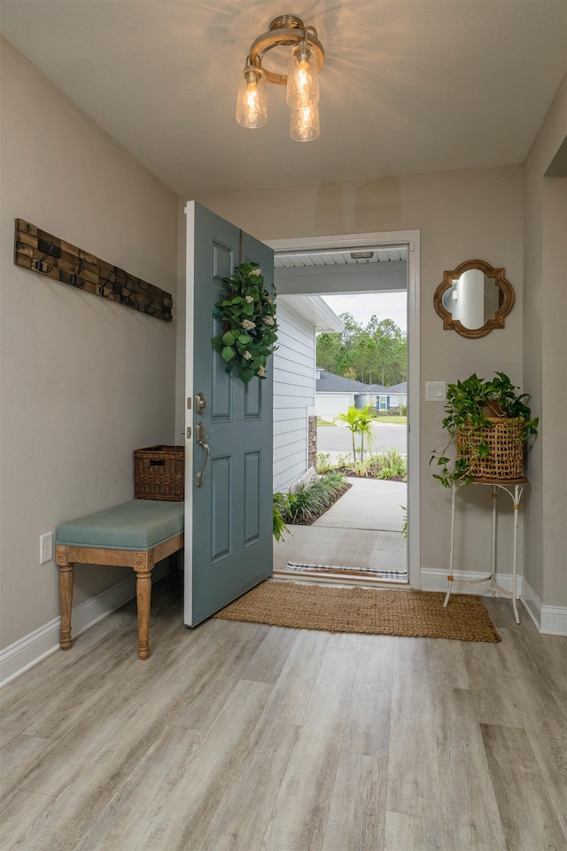 foyer with light wood-type flooring