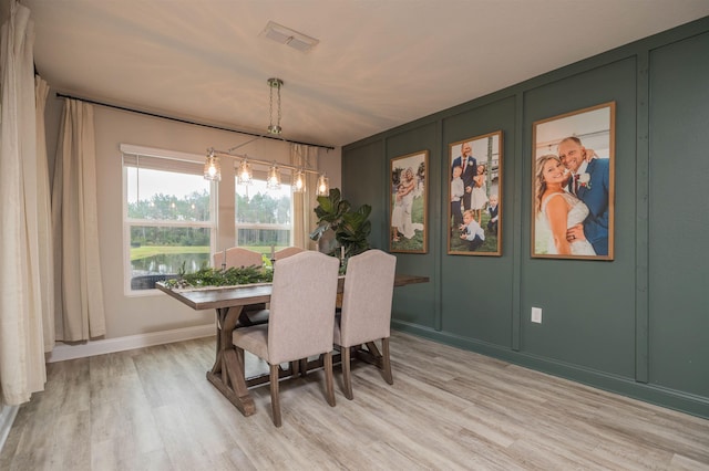 dining area with light wood-type flooring