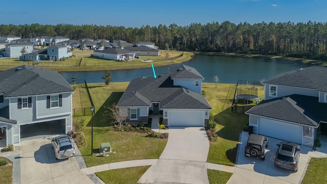 bird's eye view with a water view