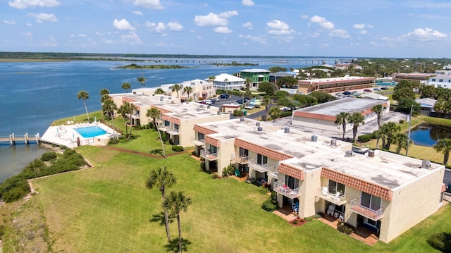 drone / aerial view with a water view