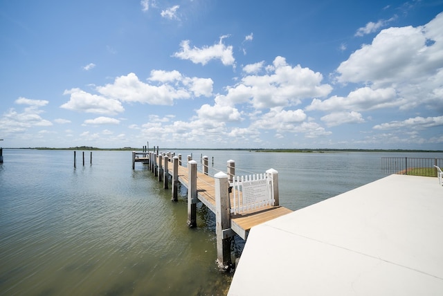 view of dock with a water view