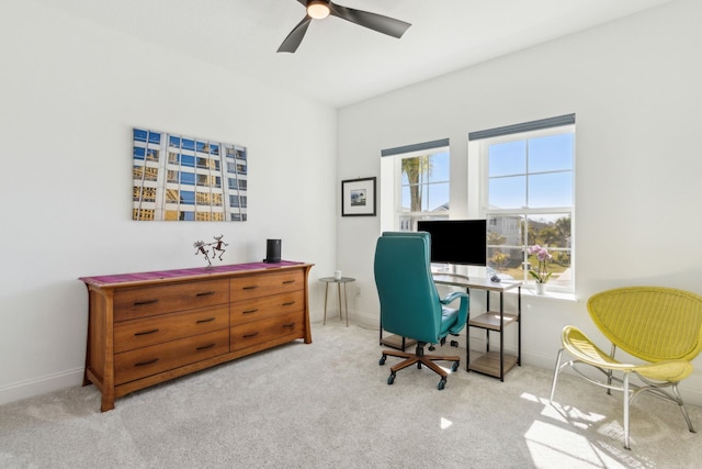 home office with baseboards and carpet floors