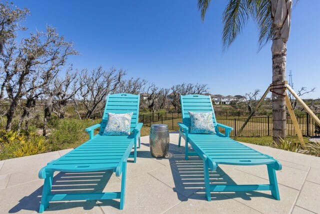 view of patio / terrace with fence