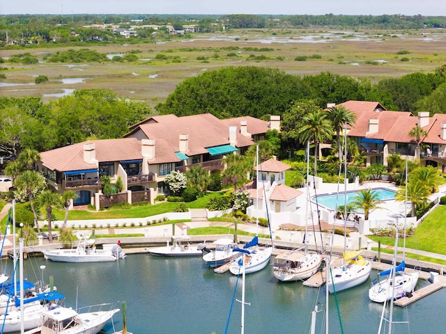 bird's eye view with a water view