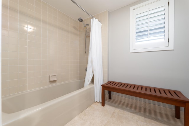 bathroom featuring tile patterned floors and shower / bath combo