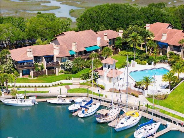 birds eye view of property featuring a water view