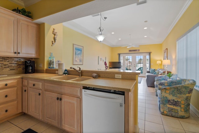 kitchen with dishwasher, light brown cabinets, french doors, decorative backsplash, and sink