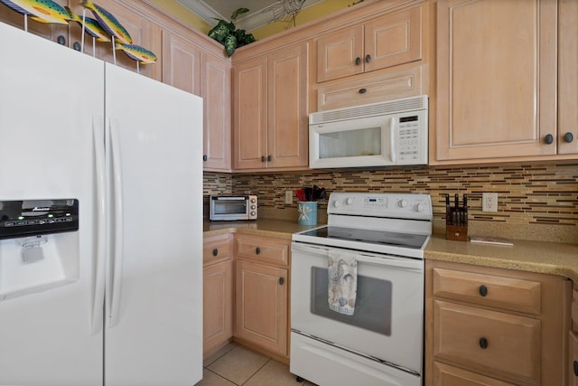 kitchen featuring light tile patterned floors, light brown cabinetry, decorative backsplash, and white appliances