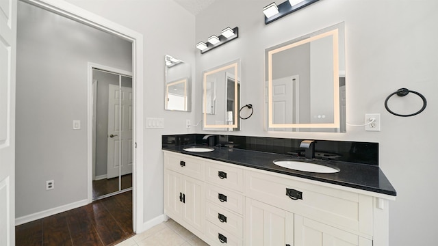 bathroom featuring vanity and tile patterned flooring