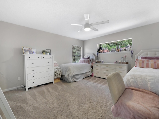 847 Tides End Dr, Saint Augustine, FL 32080 - bedroom with ceiling fan, light carpet, and baseboards