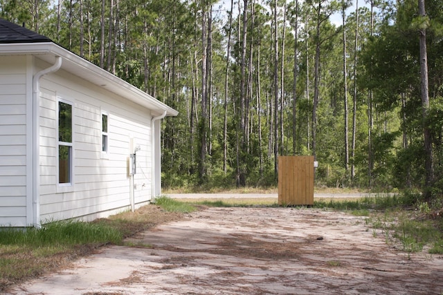 4350 Theresa St, Hastings, FL 32145 - wooden deck with a wooded view