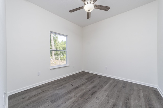 4350 Theresa St, Hastings, FL 32145 - spare room with dark wood-style flooring and a ceiling fan