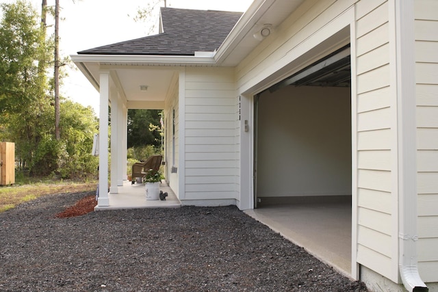 4350 Theresa St, Hastings, FL 32145 - doorway to property with a shingled roof
