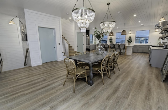 16/18/20 Inlet Pl, Saint Augustine, FL 32080 - dining area with a chandelier, light wood-type flooring, stairway, and recessed lighting