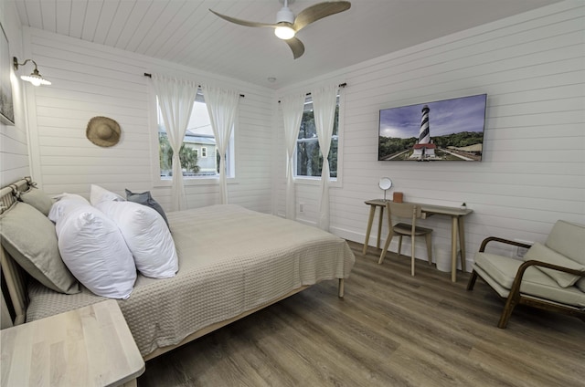 16/18/20 Inlet Pl, Saint Augustine, FL 32080 - bedroom featuring wood finished floors, wood walls, and ceiling fan