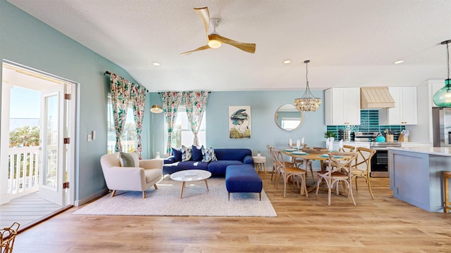 16/18/20 Inlet Pl, Saint Augustine, FL 32080 - living room with plenty of natural light, light wood finished floors, lofted ceiling, a ceiling fan, and recessed lighting