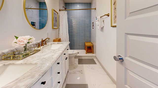 16/18/20 Inlet Pl, Saint Augustine, FL 32080 - full bathroom featuring toilet, marble look tile flooring, baseboards, and tiled shower