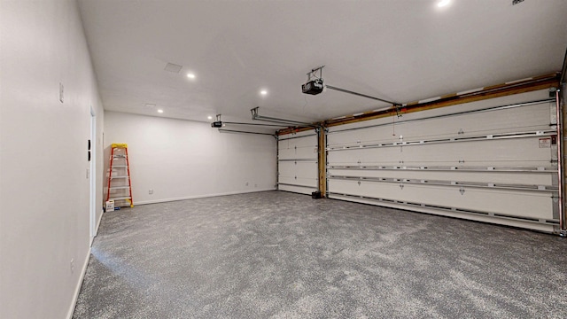 16/18/20 Inlet Pl, Saint Augustine, FL 32080 - garage featuring recessed lighting, a garage door opener, and baseboards