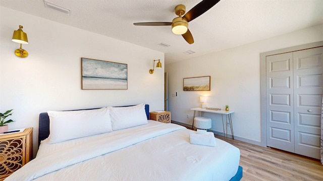 16/18/20 Inlet Pl, Saint Augustine, FL 32080 - bedroom with light wood-type flooring, a ceiling fan, baseboards, and a closet