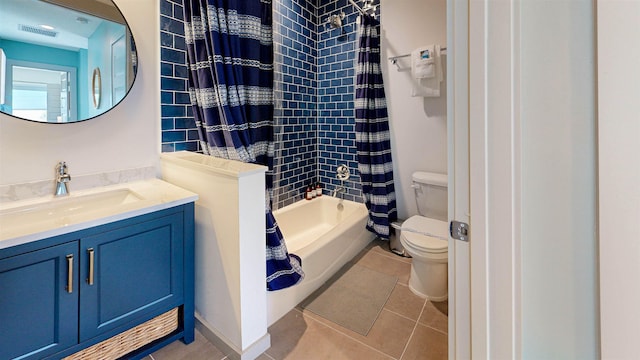 16/18/20 Inlet Pl, Saint Augustine, FL 32080 - bathroom with toilet, shower / bath combination with curtain, tile patterned flooring, and vanity