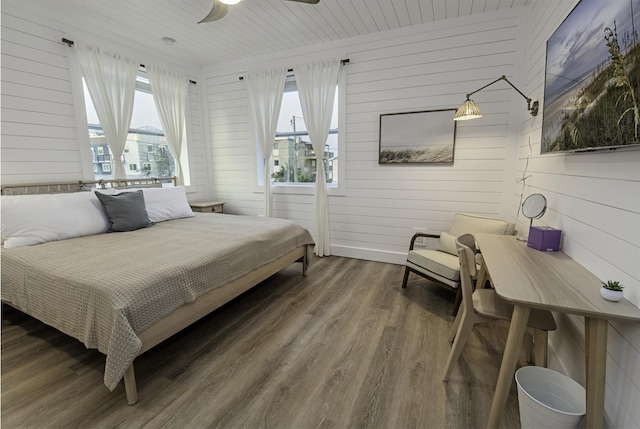 16/18/20 Inlet Pl, Saint Augustine, FL 32080 - bedroom featuring wooden walls, wood finished floors, and a ceiling fan