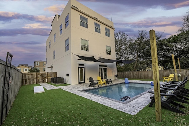 16/18/20 Inlet Pl, Saint Augustine, FL 32080 - back of property with stucco siding, a patio, and central air condition unit
