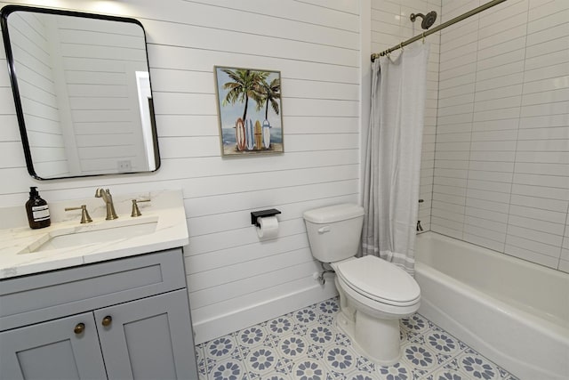 16/18/20 Inlet Pl, Saint Augustine, FL 32080 - bathroom with toilet, wood walls, shower / bath combo, vanity, and tile patterned floors