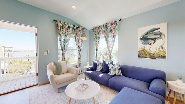 16/18/20 Inlet Pl, Saint Augustine, FL 32080 - living area featuring lofted ceiling, wood finished floors, recessed lighting, and a water view