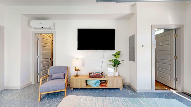 16/18/20 Inlet Pl, Saint Augustine, FL 32080 - sitting room with a wall unit AC, baseboards, and electric panel
