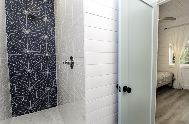 16/18/20 Inlet Pl, Saint Augustine, FL 32080 - full bathroom featuring wood finished floors, a tile shower, and ensuite bath