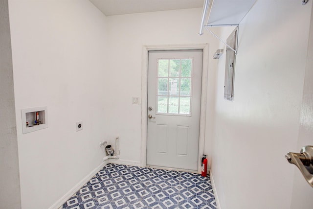 washroom with light floors, laundry area, baseboards, electric dryer hookup, and washer hookup