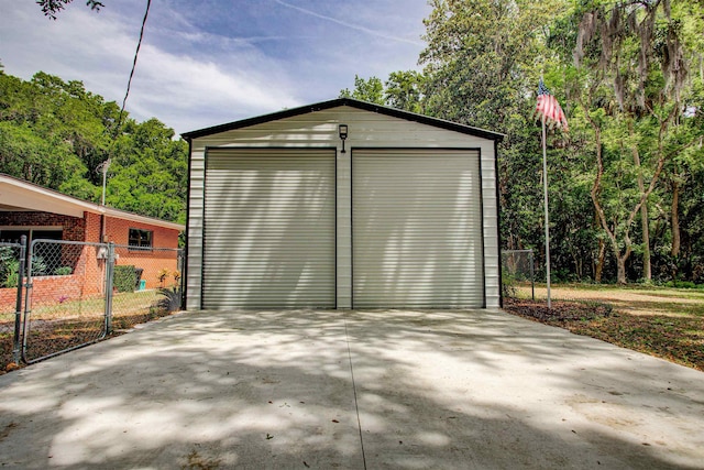 detached garage with fence